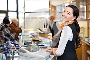 Salesperson at cash register