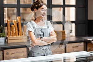 Saleswoman at the cafe or confectionery shop