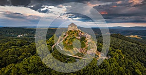 Salgotarjan, Hungary - Aerial panoramic view of Salgo Castle (Salgo vara) in Nograd county with dark clouds above photo