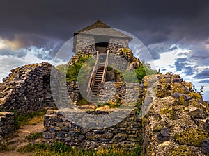 Salgotarjan, Hungary - Salgo Castle (Salgo vara) in Nograd county with dark storm clouds above