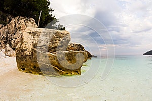 Saliara Beach called Marble Beach, beautiful white beach in Thassos island, Greece. Water and rocks