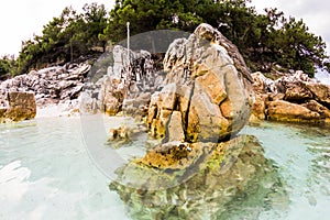 Saliara Beach called Marble Beach, beautiful white beach in Thassos island, Greece. Water and rocks