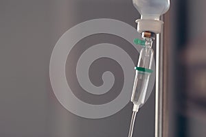 Saline Solution IV Drip Fluid for Infusion in Hospital Background