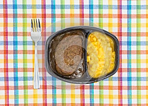 Salisbury steak meal with macaroni and cheese TV dinner