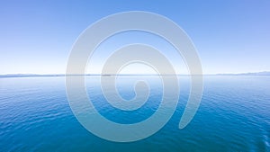 salish sea view of the shoreline of the north west coast of Vacouver taken from the ocean, British Columbia, Canada photo