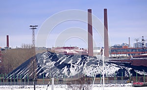 Salmisaari power plant in Helsinki, smoke comes from brick chimney of power boiler, high pollution from coal-fired power plant,
