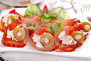 Salmon appetizer with cream cheese and olives