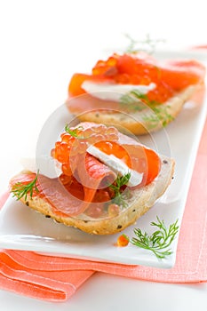 Salmon appetizer with red caviar