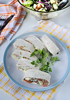 Salmon, avocado and cream cheese roll in lavash