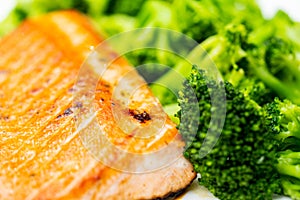 Salmon and broccoli florets macro food photography