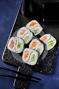Salmon and cucumber futomaki rolls with yin-yang design