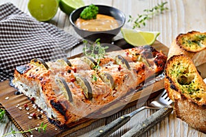 Salmon fillet on cedar wood plank