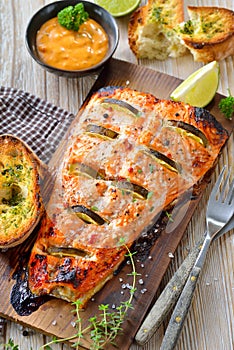 Salmon fillet on cedar wood plank