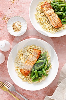 Salmon fillet grilled with bulgur and green beans. Healthy food, diet. Top view