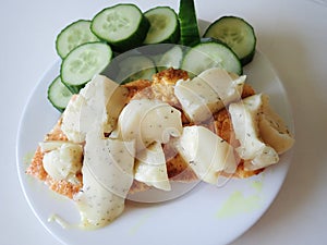 salmon fillet with vegerables on a plate