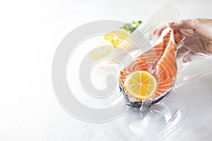 Salmon fillets in a vacuum package. Sous-vide, new technology cuisine