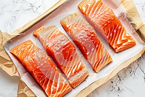 Salmon fillets on a white background