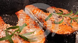 Salmon fish fillet in frypan