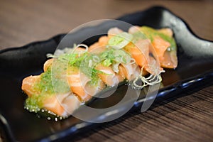 Salmon fish seafood sashimi mix with Thai sauce