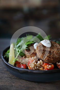Salmon fishcakes with oat and salad