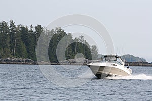 Salmon fishing boat cruising photo