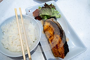 Salmon grilled sea food, rice salads. Japanese grilled salmon food isolated