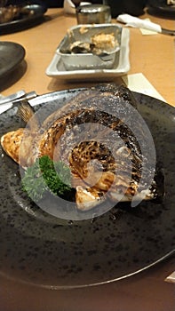 Salmon head in Sushi Tei