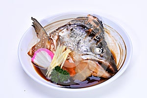Salmon kabutoni , a steamed salmon head with soy sauce