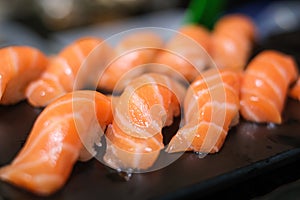 Salmon nigiri, a side view of rich omega 3 fatty food . Japanese traditional food