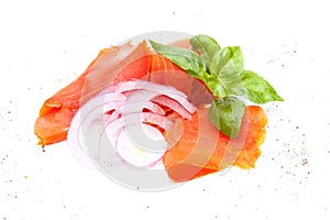 Salmon and onion rings isolated on white background