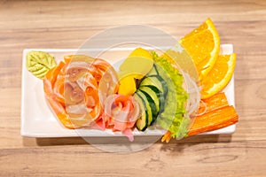 Salmon raw sashimi On white plate in a restaurant,food japanese