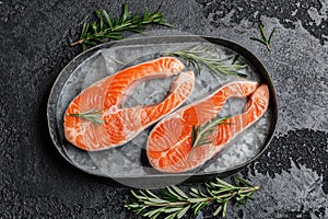 Salmon. Raw trout red fish steak with ingredients for cooking. Cooking Salmon, sea food. Healthy eating concept