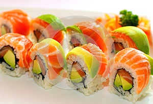 Salmon rolls. Japanese cuisine. Traditional sushi roll with salmon. Asian traditional food sake maki. Set sushi roll.