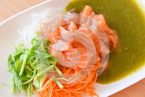 Salmon salad menu set Japanese cuisine fresh ingredients on plate - Japanese food raw sashimi salmon fillet with carrot celery