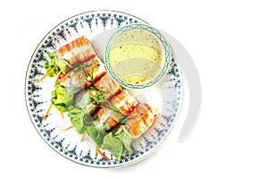 Salmon salad rolls with dipping sauce