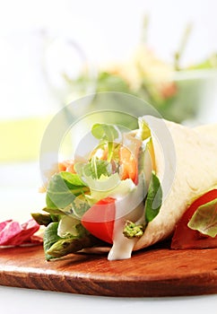 Salmon salad tortilla wrap