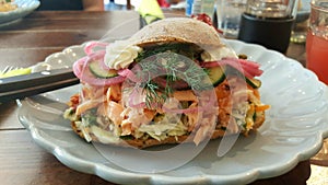 Salmon sandwich in traditional Danish bistro serving local fresh organic food. Photographed in Aalborg, Denmark.