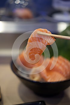 Salmon sashimi cutting fresh and raw pieces