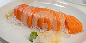 Salmon Sashimi fish Japanese food. Salmon raw sashimi on white plate