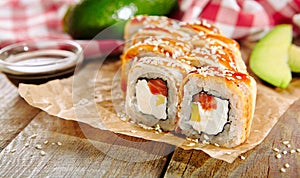 Salmon and Smoked Eel Sushi Roll with Pickled Daikon
