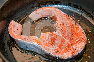 Salmon steak in the frypan
