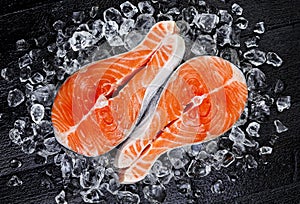 Salmon steak on ice, top view