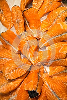 Salmon steaks chilled on a background of white ice. Seafood, fish