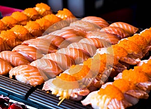 Salmon sushi arranged in a tray