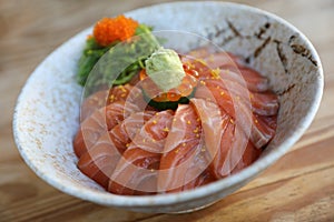 Salmon sushi don on wooden table , Japanese food