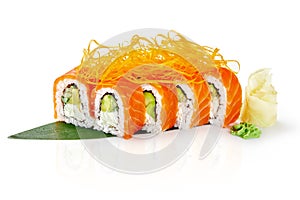 Salmon sushi rolls with mamenori shavings on bamboo leaf