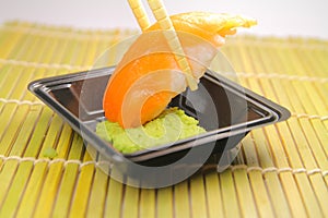 Salmon sushi and wasabi photo