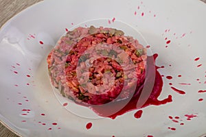 Salmon tartar with cauce photo
