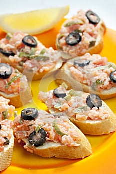 salmon tartare with capers and black olives