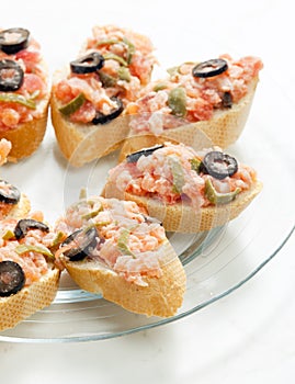 salmon tartare with capers and black olives